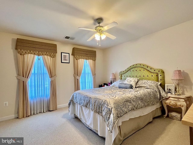 4718 Village Dr, Fairfax, VA 22030 - carpeted bedroom with baseboards and a ceiling fan