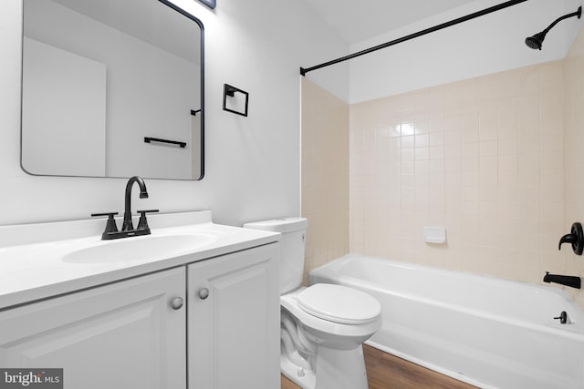 1065 Old Forge Rd, New Castle, DE 19720 - bathroom with toilet, vanity, wood finished floors, and shower / tub combination
