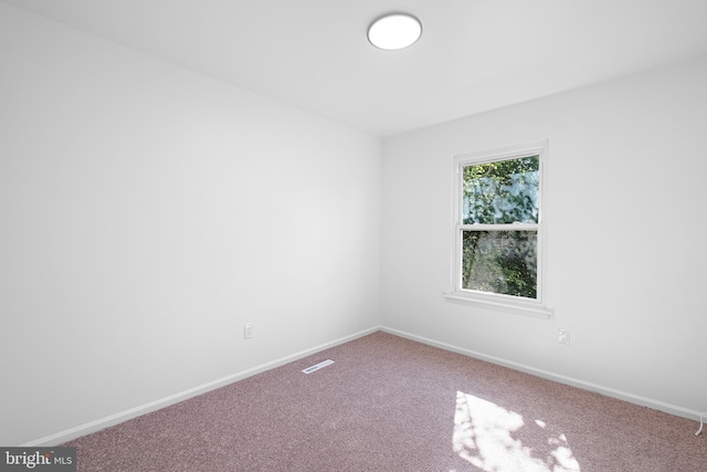 1065 Old Forge Rd, New Castle, DE 19720 - carpeted empty room with baseboards