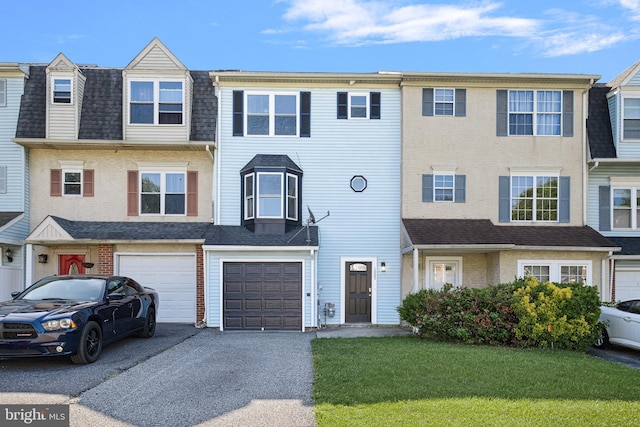 1065 Old Forge Rd, New Castle, DE 19720 - view of property featuring driveway, an attached garage, and a front lawn