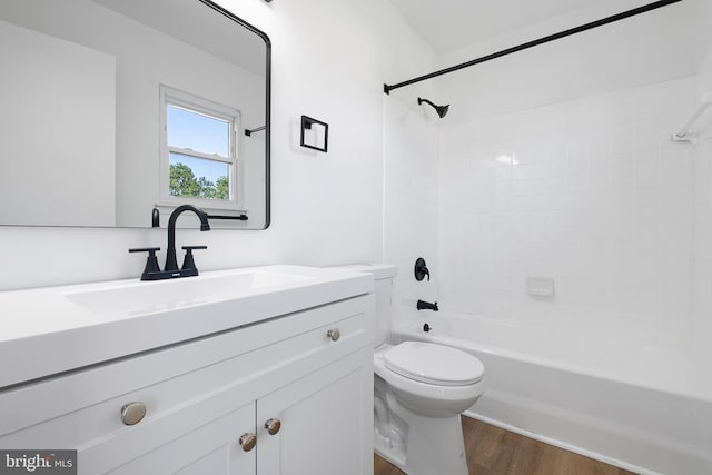 1065 Old Forge Rd, New Castle, DE 19720 - full bathroom with toilet, wood finished floors, vanity, and shower / tub combination