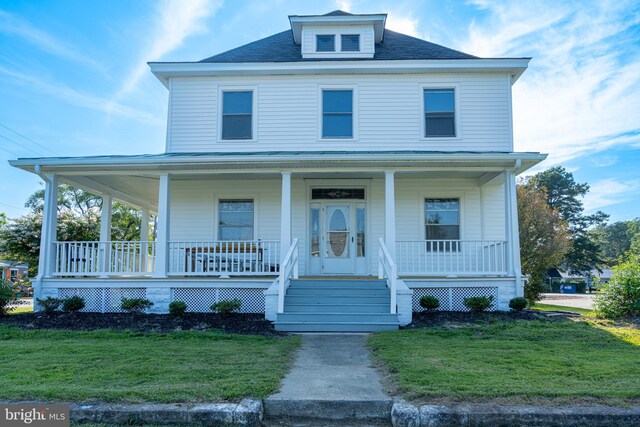 89 Main St N, Kilmarnock, VA 22482 - view of front of property featuring a front lawn and covered porch