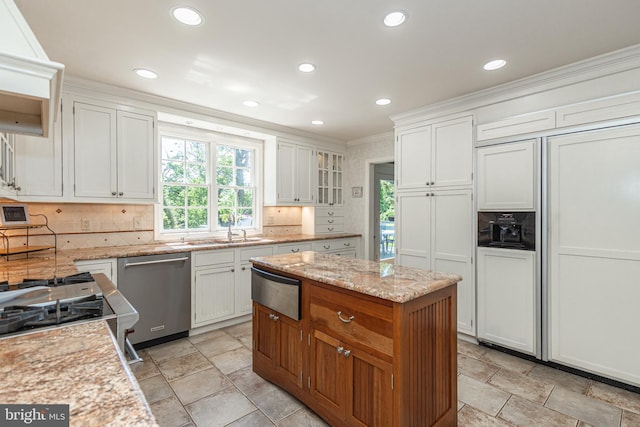 3048 Aquetong Rd, New Hope, PA 18938 - kitchen featuring stainless steel dishwasher, a warming drawer, plenty of natural light, paneled fridge, and ornamental molding