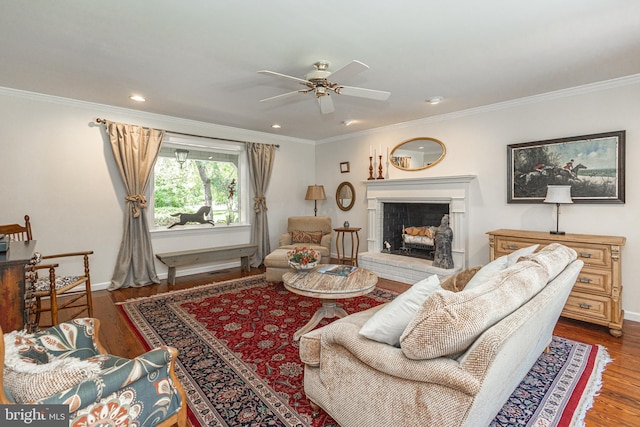3048 Aquetong Rd, New Hope, PA 18938 - living room featuring ceiling fan, wood finished floors, baseboards, crown molding, and a fireplace with raised hearth