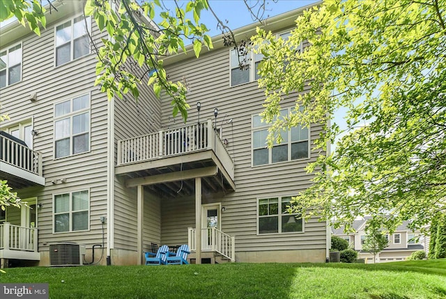 304 Redbud Ln, Kennett Square, PA 19348 - rear view of property featuring central AC, a balcony, and a lawn