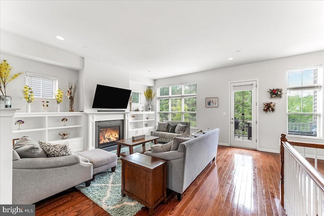 304 Redbud Ln, Kennett Square, PA 19348 - living room with a glass covered fireplace, wood-type flooring, recessed lighting, and baseboards