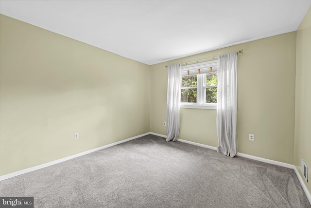 747 Mchenry St, Baltimore, MD 21230 - empty room featuring carpet floors and baseboards