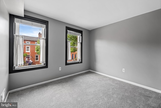747 Mchenry St, Baltimore, MD 21230 - empty room featuring carpet floors and baseboards