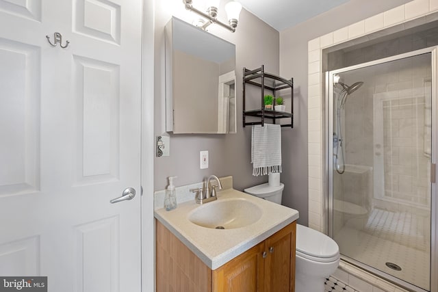 747 Mchenry St, Baltimore, MD 21230 - bathroom with toilet, a stall shower, and vanity