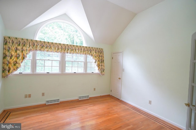 301 Country Club Trl, Fairfield, PA 17320 - spare room featuring lofted ceiling, light wood-style flooring, and baseboards
