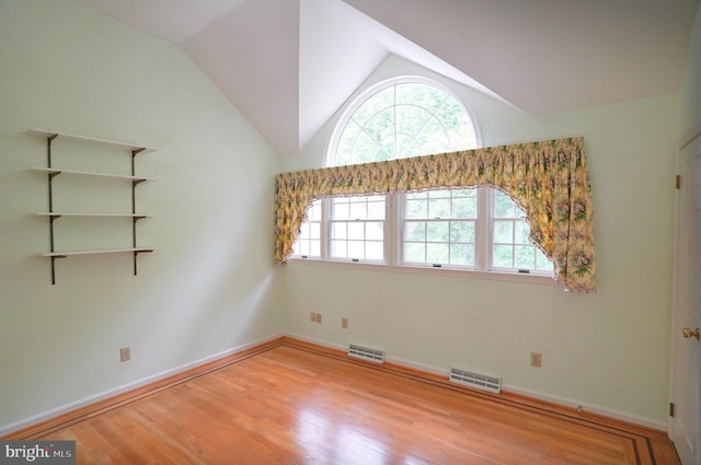 301 Country Club Trl, Fairfield, PA 17320 - unfurnished room with healthy amount of natural light, wood finished floors, baseboards, and lofted ceiling
