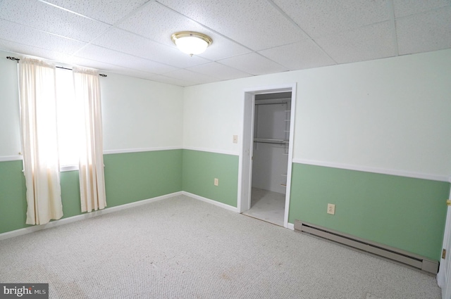 301 Country Club Trl, Fairfield, PA 17320 - unfurnished bedroom featuring a baseboard heating unit, a drop ceiling, a closet, carpet, and baseboards