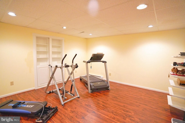 301 Country Club Trl, Fairfield, PA 17320 - workout room featuring wood finished floors, a paneled ceiling, baseboards, built in shelves, and recessed lighting