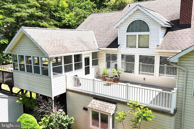 301 Country Club Trl, Fairfield, PA 17320 - back of property featuring a sunroom, a shingled roof, and a chimney