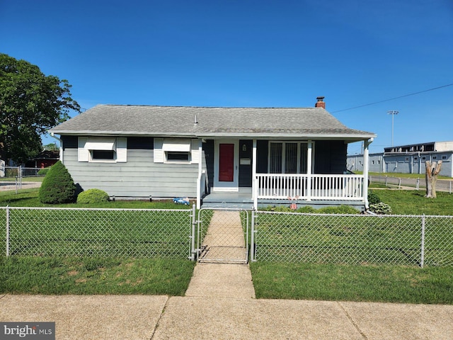 610 N 8th St, Millville, NJ 08332 - view of front of property featuring covered porch, a gate, and a chimney