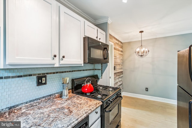2237 Farrington Ave Unit 301, Alexandria, VA 22303 - kitchen with black appliances, ornamental molding, white cabinets, decorative backsplash, and light stone countertops