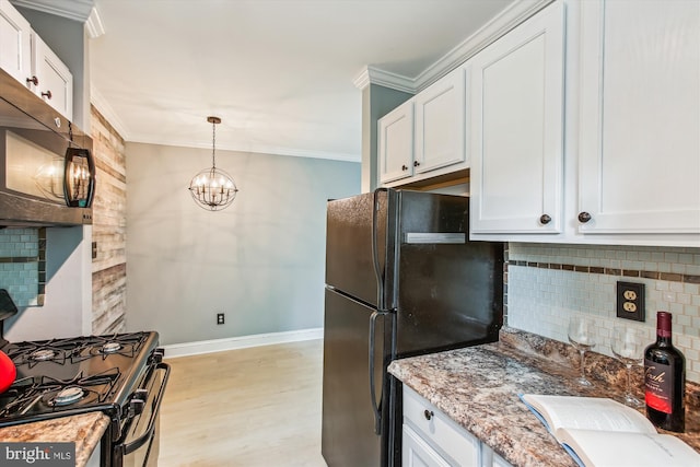 2237 Farrington Ave Unit 301, Alexandria, VA 22303 - kitchen featuring black appliances, backsplash, baseboards, light wood finished floors, and light stone countertops
