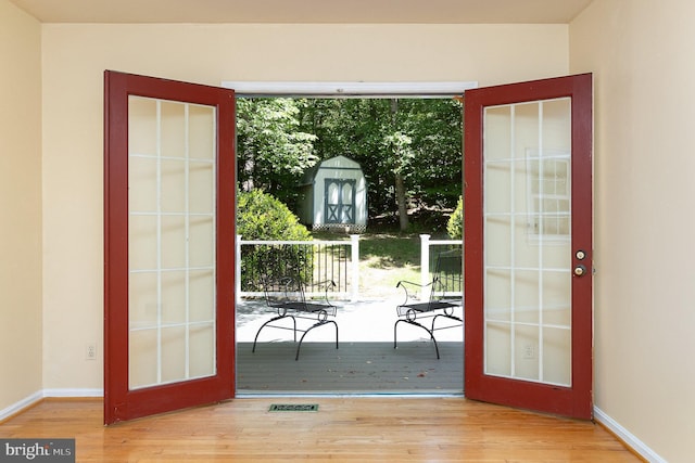 2070 Farragut Dr, Stafford, VA 22554 - doorway featuring wood finished floors, french doors, and baseboards