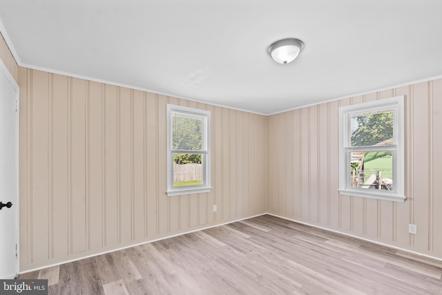 311 W Washington St, Paulsboro, NJ 08066 - spare room featuring wood finished floors, plenty of natural light, and crown molding