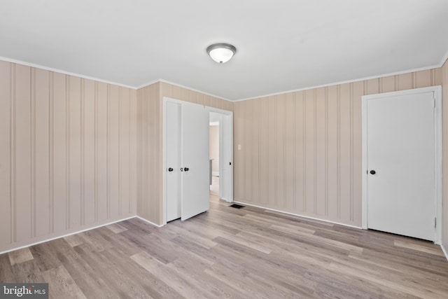 311 W Washington St, Paulsboro, NJ 08066 - empty room with ornamental molding and wood finished floors