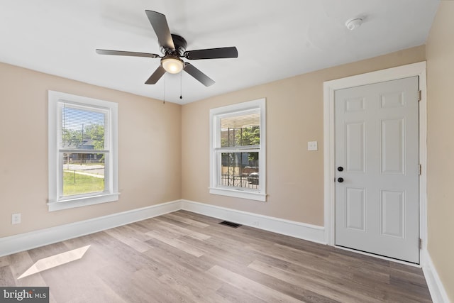 311 W Washington St, Paulsboro, NJ 08066 - entrance foyer featuring plenty of natural light, wood finished floors, and baseboards