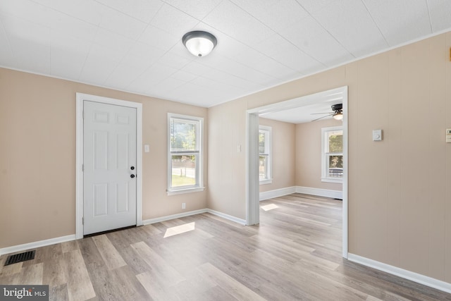 311 W Washington St, Paulsboro, NJ 08066 - foyer with light wood-style flooring, ceiling fan, and baseboards