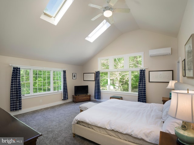 1180 Radnor Hill Rd, Wayne, PA 19087 - carpeted bedroom featuring a wall unit AC, a skylight, lofted ceiling, a ceiling fan, and baseboards