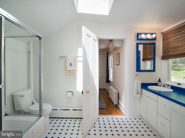 1180 Radnor Hill Rd, Wayne, PA 19087 - full bathroom featuring a baseboard radiator, radiator, an AC wall unit, a skylight, and toilet
