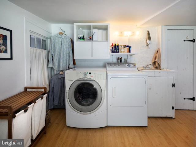1180 Radnor Hill Rd, Wayne, PA 19087 - washroom featuring washing machine and dryer and light wood-style flooring