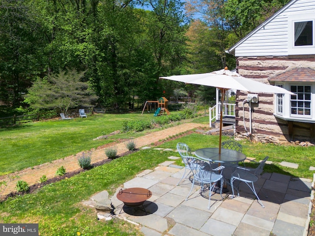 1180 Radnor Hill Rd, Wayne, PA 19087 - view of patio featuring a playground and outdoor dining space
