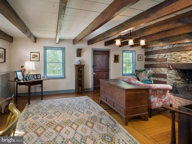 1180 Radnor Hill Rd, Wayne, PA 19087 - living area with wood finished floors, beam ceiling, and baseboards