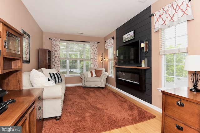 14 Coolidge Way, Princeton, NJ 08540 - living area featuring a fireplace, wood finished floors, and baseboards