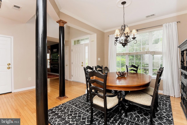 14 Coolidge Way, Princeton, NJ 08540 - dining room with light wood finished floors, a chandelier, crown molding, and baseboards