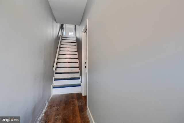 2213 E Madison St, Baltimore, MD 21205 - staircase with wood finished floors and baseboards