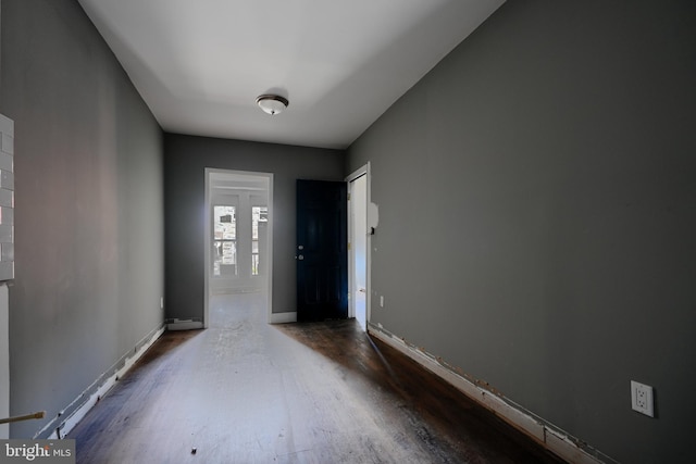 2213 E Madison St, Baltimore, MD 21205 - foyer entrance featuring wood finished floors and baseboards