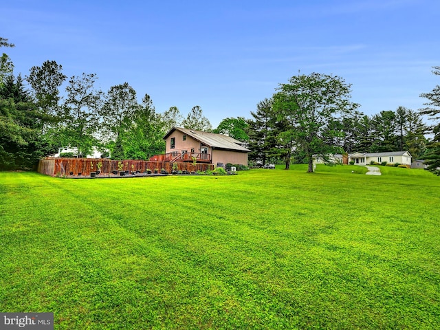 2 Barnstable Ct, Owings Mills, MD 21117 - view of green lawn with a wooden deck