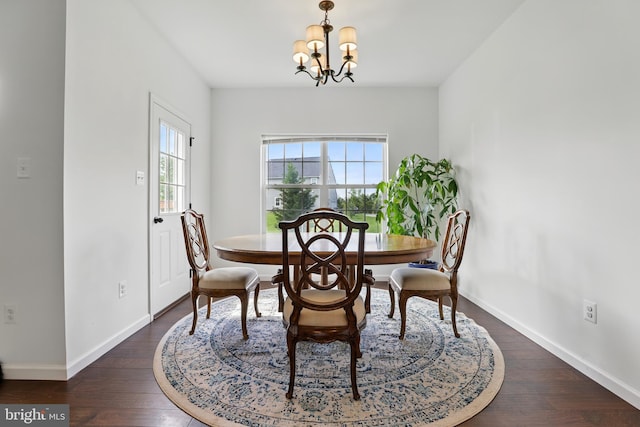 1606 Trotter St, Frederick, MD 21702 - dining space with a chandelier, dark wood-type flooring, and baseboards