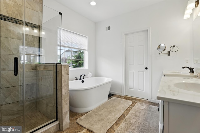 1606 Trotter St, Frederick, MD 21702 - full bath featuring a stall shower, a soaking tub, double vanity, and recessed lighting