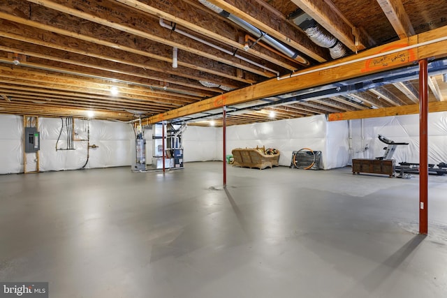 1606 Trotter St, Frederick, MD 21702 - unfinished basement with electric panel, water heater, and heating unit