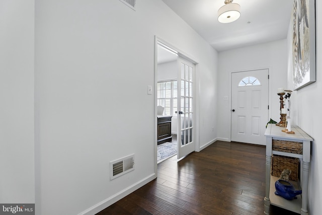 1606 Trotter St, Frederick, MD 21702 - foyer entrance featuring dark wood finished floors, baseboards, and french doors