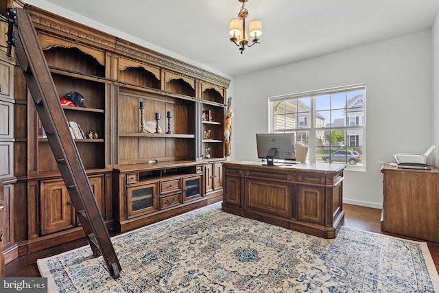 1606 Trotter St, Frederick, MD 21702 - office area featuring a chandelier, dark wood-style floors, and baseboards