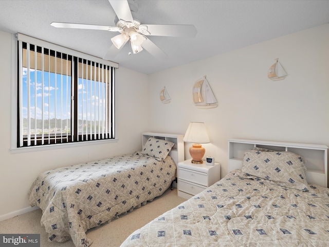 504GEORGETOWNEHOUSERD Georgetowne House Rd Unit 504, Bethany Beach, DE 19970 - carpeted bedroom featuring a ceiling fan and baseboards