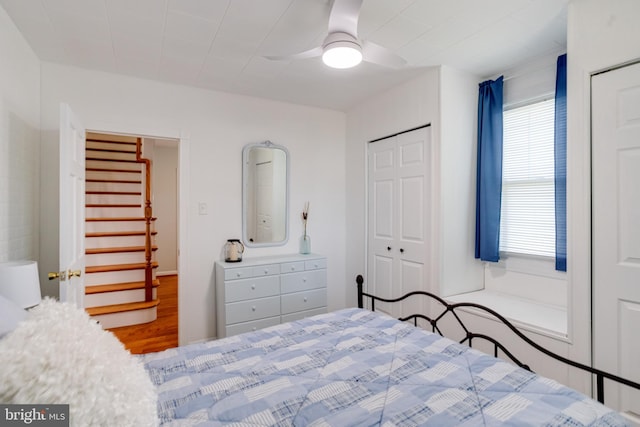 bedroom with wood finished floors and ceiling fan