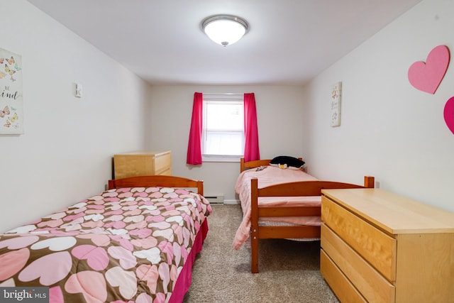 bedroom with carpet and baseboard heating