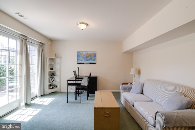 office featuring light carpet and baseboards