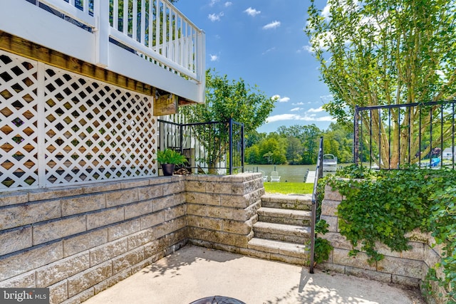 view of patio / terrace with a water view