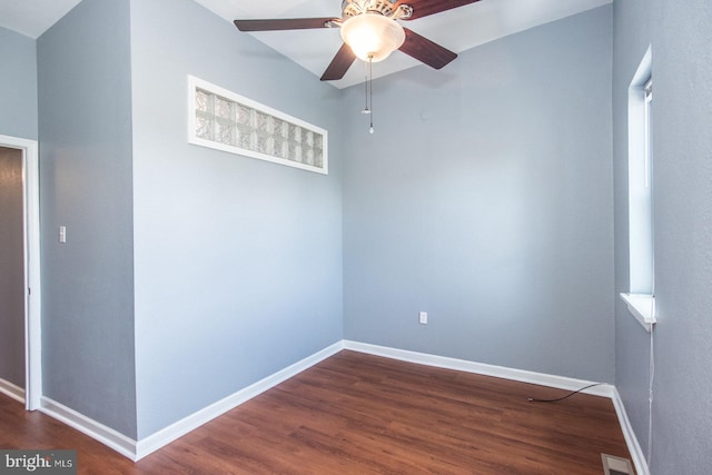 3539 Almond St, Philadelphia, PA 19134 - spare room with a ceiling fan, dark wood-type flooring, and baseboards