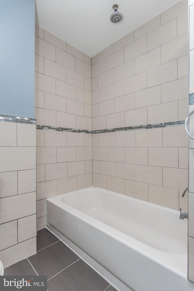 3539 Almond St, Philadelphia, PA 19134 - full bathroom featuring tile walls, tile patterned floors, and shower / tub combination