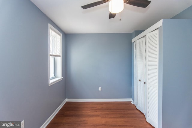 3539 Almond St, Philadelphia, PA 19134 - unfurnished bedroom featuring a closet, wood finished floors, baseboards, and a ceiling fan