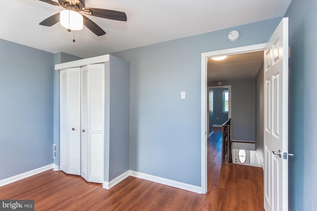3539 Almond St, Philadelphia, PA 19134 - unfurnished bedroom featuring wood finished floors, a closet, baseboards, and a ceiling fan